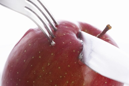 Apple and forkの写真素材