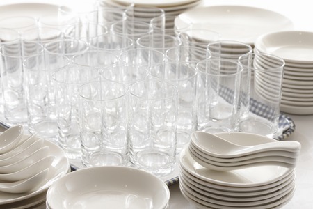 Lots of dishes and cupsの写真素材