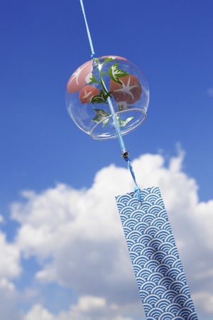Blue skies and wind chimesの写真素材