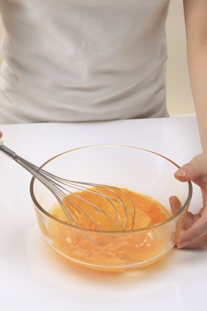 Mix the eggsの写真素材