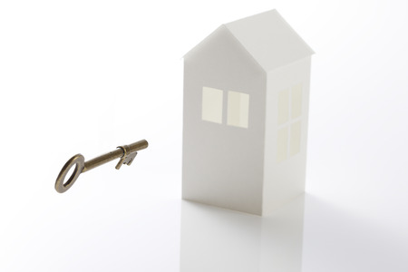 Paper house and keyの写真素材