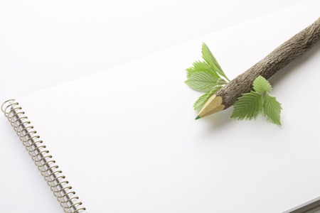 Colored pencil and sketchbookの写真素材