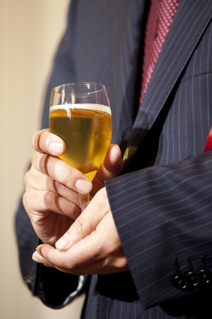 Hand-up of toast greetingの写真素材