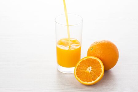 Oranges and orange juiceの写真素材