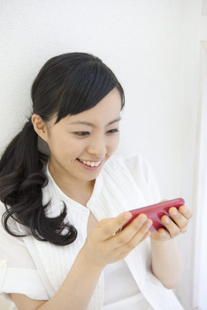 Women to take the Smartphoneの写真素材