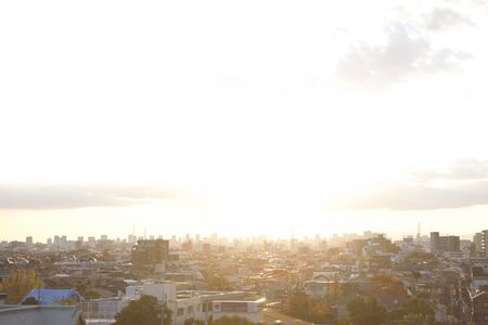 City lit by the setting sunの写真素材