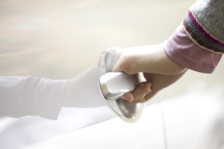 Woman to open the car doorの写真素材