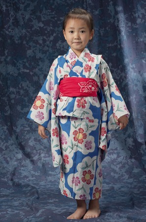 Girl standing in yukataの写真素材