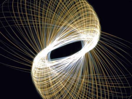 Light trace of drawn glow while twistingの写真素材