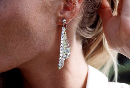 Up of women who have a long earrings