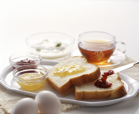 Strawberry jam and marmalade toast