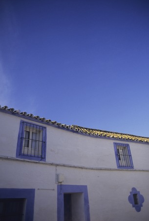 Blue windows and blue skyの写真素材