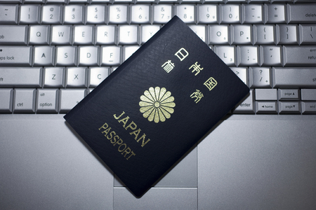 Keyboard and passportの写真素材