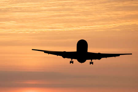 Morning glow and airliner