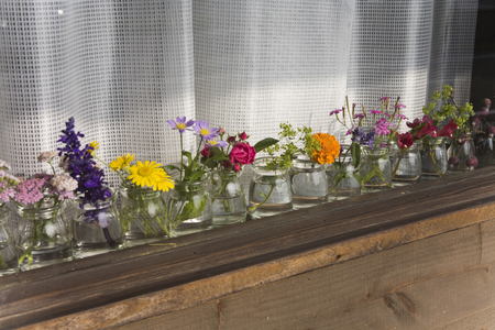 Windowsill of flowersの写真素材
