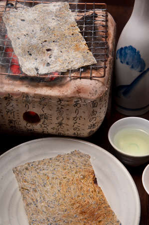 Tatami iwashi and sakeの写真素材