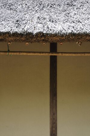 Japanese house and the earthen wall and a laundry poleの写真素材
