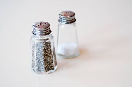 Salt and pepper on the tableの写真素材