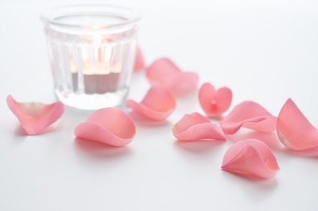 Rose petals and candlesの写真素材