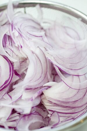 Slice of red onionの写真素材