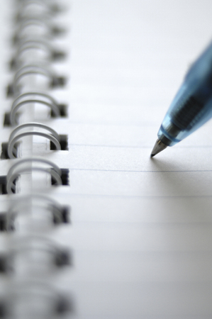 Notebook and ballpoint penの写真素材