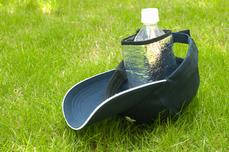 Hat and plastic bottlesの写真素材