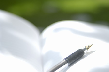 Notebook and ballpoint penの写真素材