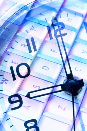 Synthesis of laptop keyboard and watchの写真素材