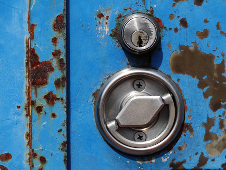 Key and the handle of the iron doorの写真素材