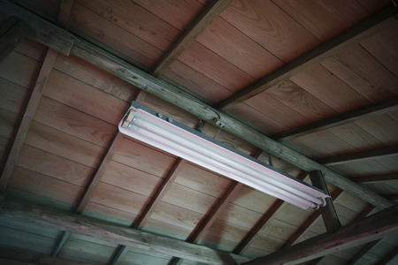 Fluorescent lamp was turned off to save powerの写真素材