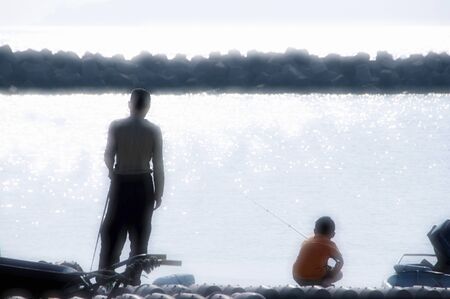 Parent and child to the fishingの写真素材