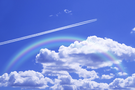 Blue sky and contrailの写真素材