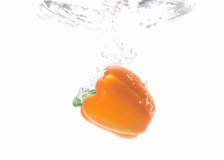 Moment water enters the paprikaの写真素材
