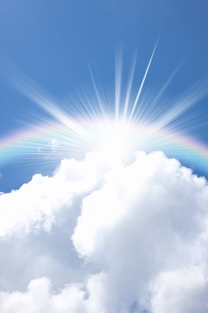 Towering cloud in summer and the Sunの写真素材