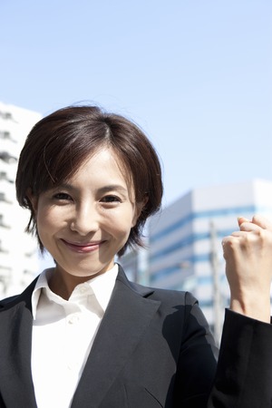 OL to take guts poseの写真素材