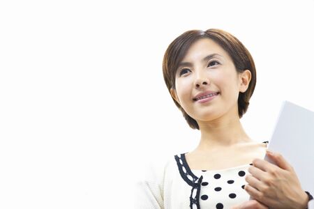 Woman facing materialsの写真素材