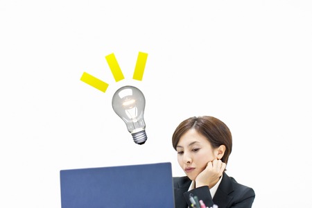 Boring look of OLの写真素材