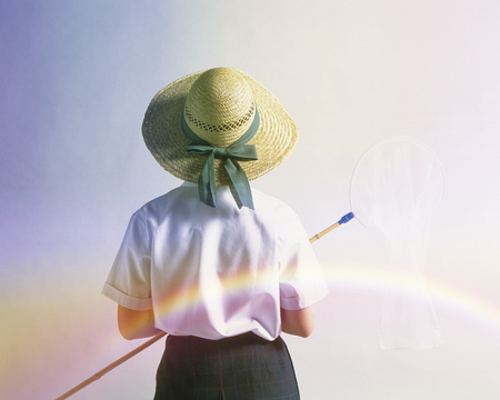 Boy who suffered a straw hatの写真素材