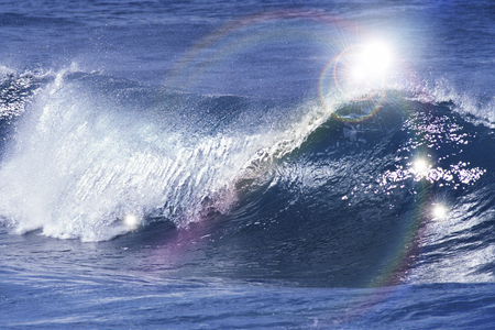 Waves and rainbowsの写真素材