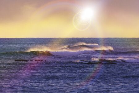 Waves and rainbowsの写真素材