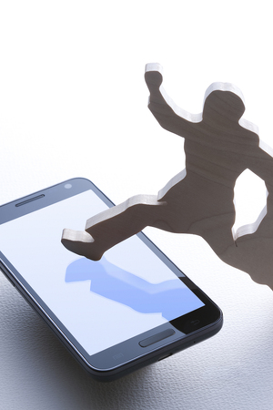 Smartphones and businessmanの写真素材