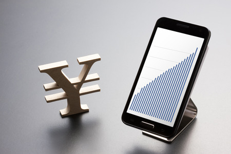 Yen and Smartphonesの写真素材