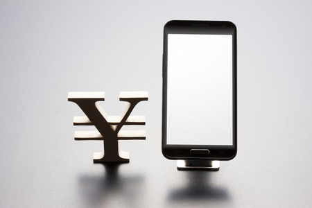 Yen and Smartphonesの写真素材