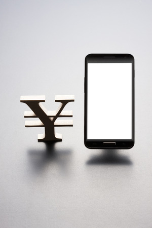 Yen and Smartphonesの写真素材