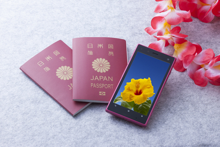 Smart phones and passportsの写真素材