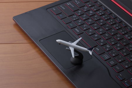 Laptop computers and airplanesの写真素材
