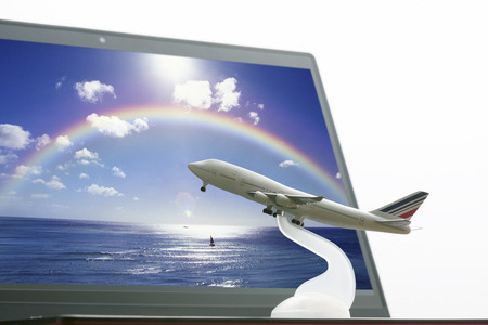 Laptop computers and airplanesの写真素材