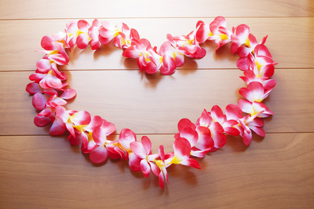 Heart-shaped wreath of frangipaniの写真素材