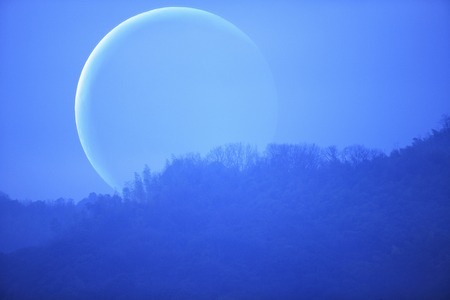 Moon and mountainsの写真素材