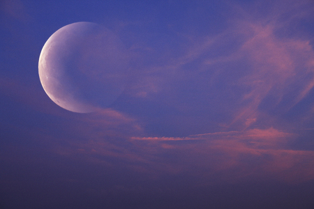Moon and sunsetの写真素材